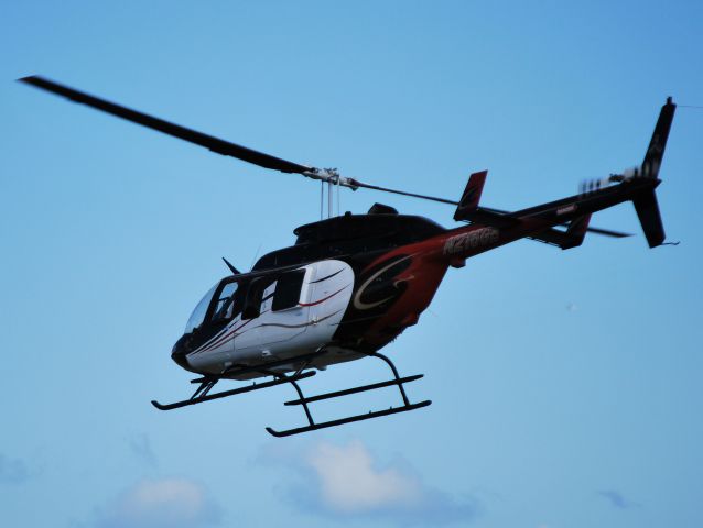Bell JetRanger (N216GB) - ILLINOIS WING & ROTOR INC (NASCAR driver Greg Biffle) at KJQF transporting attendees of the Coca-Cola 600 across I-85 to the Charlotte Motor Speedway - 5/27/12