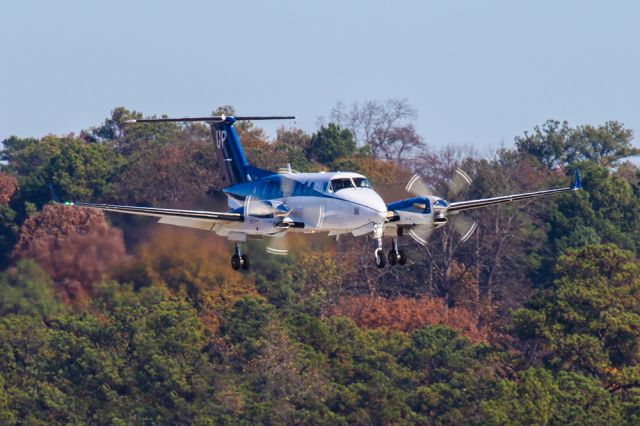 Beechcraft Super King Air 350 (N836UP) - On a beautiful afternoon at Atlanta's PDK airport, the airport was fairly busy and I was getting some great shots all day. This Wheels Up King Air 350 was on final approach when I got this photo. I was using my 600mm Canon lens (on a monopod), but it was still tricky to get a clear shot as the shutter speed was down enough to see prop movement, while keeping the aircraft in focus from the still present camera / lens motion. Again I was using a 600mm lens, the shutter was at 1/320, F16, ISO 400. Please check out my other aviation photography. Votes and positive comments are always appreciated. Questions about this photo can be sent to Info@FlewShots.com