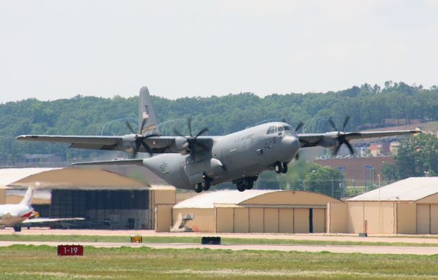 65-3147 — - A brand new C-130J with the commander of the Arkansas Air National Guard does a touch and go on runway 7. Check out the prop vorticies!