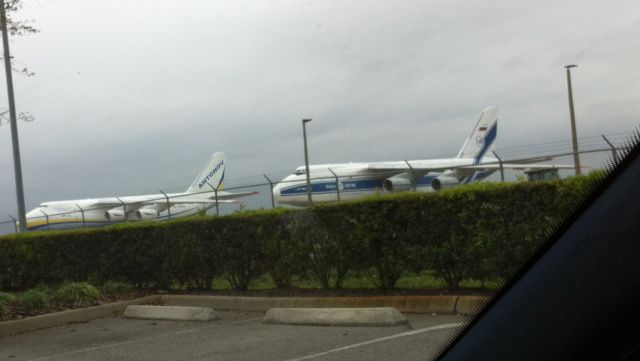 Antonov An-124 Ruslan — - A rare sight on 27FEB15. Two AN124-100s on the tarmac. One each Antonov Design Bureau and Volga-Dnepr.