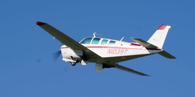 Beechcraft Bonanza (36) (N1039T) - Dan Moore, is leaving M25 after a full stop landing on his mission to set a new Guinness World Record for most airport visited in 24 Hours by a Fixed-Wing Aircraft