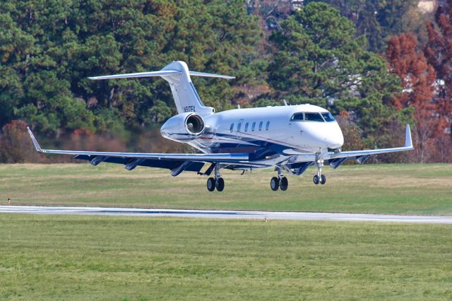 Bombardier Challenger 300 (N517FX) - Flex Jet Bombardier Challenger 300 about to touch down in Atlanta at PDK airport. Questions about this photo can be sent to Info@FlewShots.com