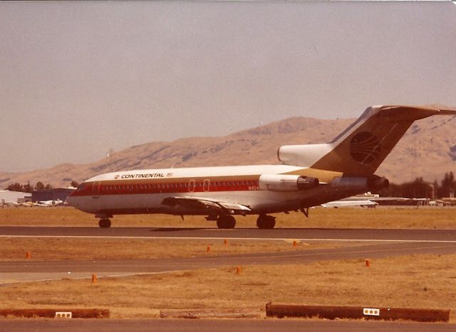 Boeing 727-100 (N40489) - l/n 191 departing runway 30L from SJC for Stapleton in this mid-1980s photo. This jet stored at KMHV.