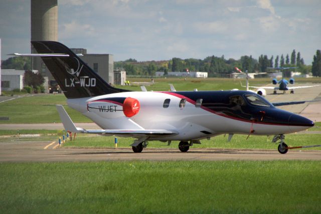 Honda HondaJet (LX-WJD) - Flying Group Lux HondaJet under tow to the ramp on 21-Jun-19 prior to departure for ELLX as FYL12JD.