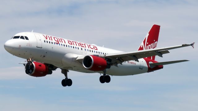 Airbus A320 (N855VA) - Virgin America N855VA, Airbus 320-214 arriving at SFO on runway 28R.  Taken from seat 33K on CX879, B-KQP on July 5, 2017. 