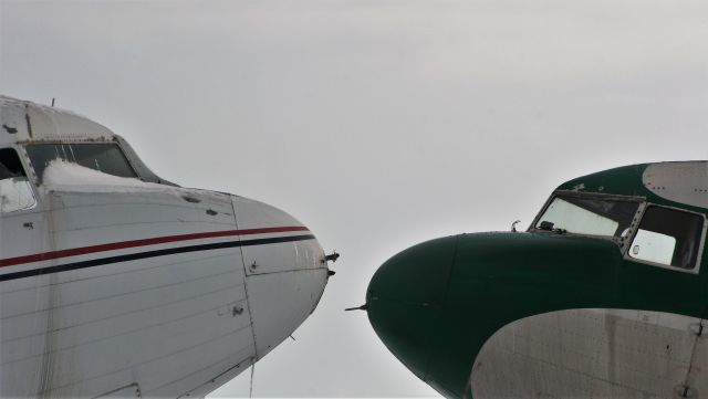 Douglas DC-3 — - DC-3s almost rubbing noses at Basler Aviation Oshkosh