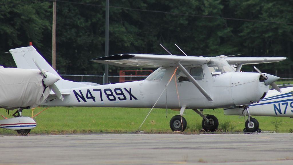 Cessna Commuter (N4789X) - Parked at Orange County Airport, 28 August 2021.