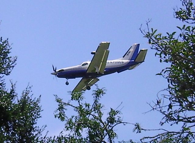 Socata TBM-700 (N700CS) - TBM N700CS on approach to Runway 05 at Spruce Creek, FL (7FL6).