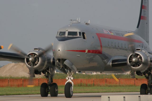 Cessna Citation III (N500EJ) - Douglas C54E "Spirit Of Freedom"br /Thunder Over Michigan, 2014br /br /From the spirtoffreedom web site:br /br /Manufactured by the Douglas Aircraft Company   S/N 27370 and delivered to the Army Air Corps in March of 1945 as 44-9144.  She was then part of a transfer of 25 C-54Es to the United States Navy and recieved a BuNo of 90414 on May 30, 1945. She then took on the designation of R-5D-4.br /br /BuNo 90414 served with various units of the US Navy, one being VR-3 and United States Marines in roles such as cargo transports, personnel transport, and finally VIP Transport.  At one time she was based in Los Alamitos before being transferred to Washington DC.