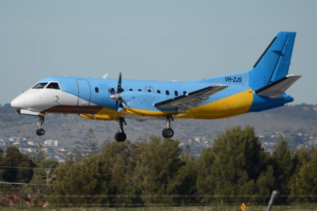 Saab 340 (VH-ZJS) - On short finals for runway 05. Wednesday, 21st May 2014.