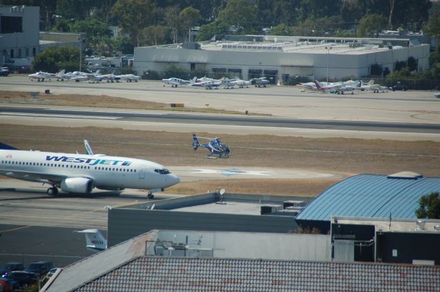 — — - EC-120 Hovering at SNA