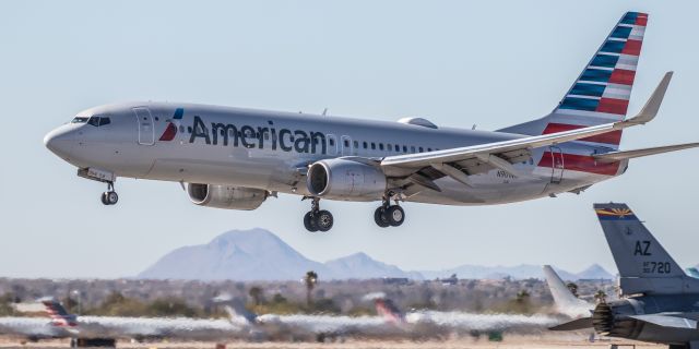 Boeing 737-800 (N901NN) - Landing at KTUS, while an F-16 from the 162nd ANG taxis by.