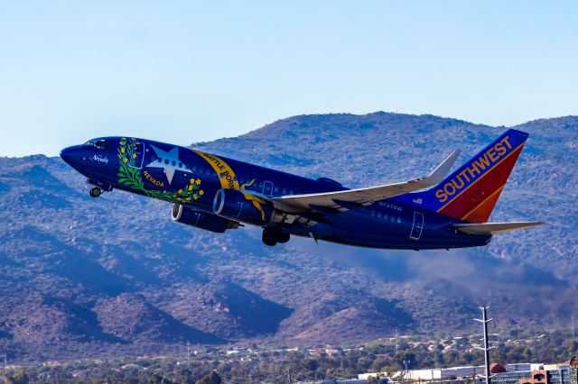 Boeing 737-700 (N727SW) - Southwest Airlines 737-700 in Nevada One special livery taking off from PHX on 10/29/22. Taken with a Canon 850D and Tamron 70-200 G2 lens.