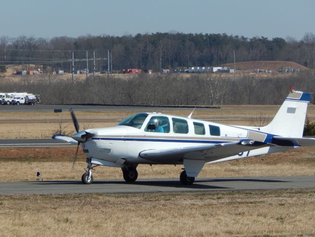 Beechcraft Bonanza (36) (N72567) - N72567, A 1985 Beechcraft Bonanza, Taxis to the runway at Manassas Reginal Airport.