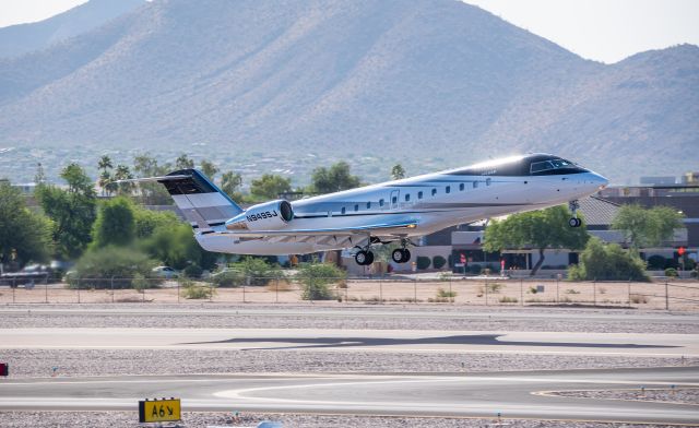 Canadair Regional Jet CRJ-100 (N949SJ) - Nice CRJ100-Challenger 850 departing KSDL