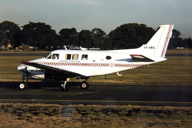 Beechcraft Super King Air 200 (VH-AMQ) - DEPARTMENT OF HEALTH - BEECHCRAFT 65-B80 QUEENAIR - REG : VH-AMQ (CN LD-443) - KINGSFORD SMITH SYDNEY NSW. AUSTRALIA - YSSY 27/6/1988 35MM SLIDE CONVERSION USING A LIGHTBOX AND A NIKON L810 DIGITAL CAMERA IN THE MACRO MODE.