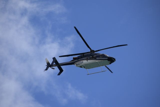 Bell 427 (N427JJ) - A windy day at the beach brings a great view of a 427 .. 