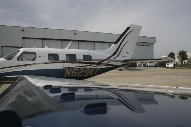 Piper Malibu Meridian (N629KC) - Sitting outside our hangar ready.