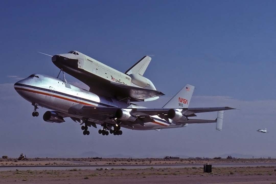 BOEING 747-100 (N905NA) - 747-123 N905NA taking off with the Space Shuttle Enterprise at Edwards Air Force Base for the first glide flight of the shuttle on August 12,1977.