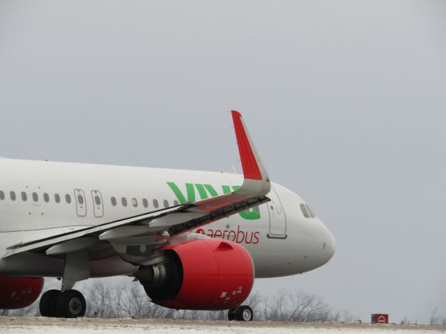 Airbus A320neo (XA-VIV) - A super rare Mexican charter at Buffalo on a cold day!!