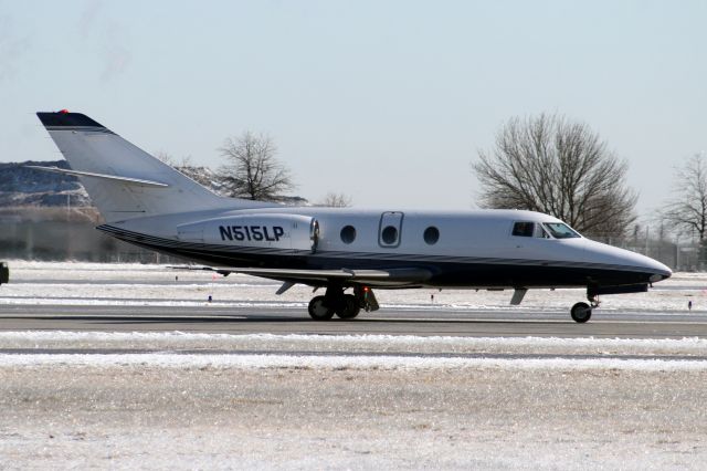 Dassault Falcon 10 (N515LP) - Taxiing to the Atlantic Aviation ramp on 15-Feb-07.