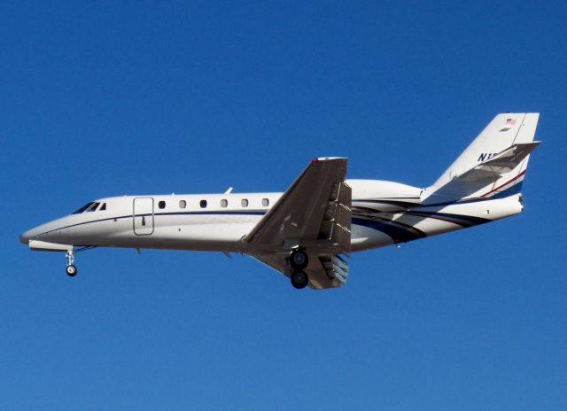 Cessna Citation Sovereign (N18WE) - "Freight Line 18" over the fence for 27R after 5.5 hour flight from KGSO.