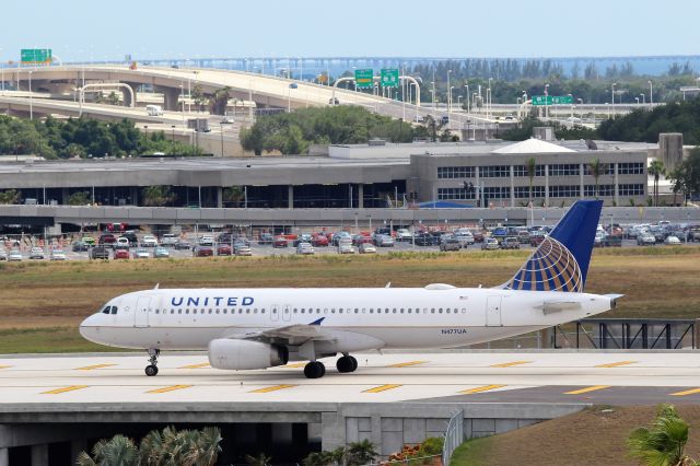 Airbus A320 (N477UA) - United Airlines (UA) N477UA A320-232 (cm1514]br /Tampa (TPA). Taxis to the gate after just arriving from Denver (DEN) United Airlines flight UA372.br /Taken from TPA Long Term Parking Garagebr /2017 05 14   a rel=nofollow href=http://alphayankee.smugmug.com/Airlines-and-Airliners-Portfolio/Airlines/AmericasAirlines/United-Airlines-UAhttps://alphayankee.smugmug.com/Airlines-and-Airliners-Portfolio/Airlines/AmericasAirlines/United-Airlines-UA/a