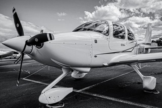 Cirrus SR-20 (N162AK) - On eastern ramp at KHEF 