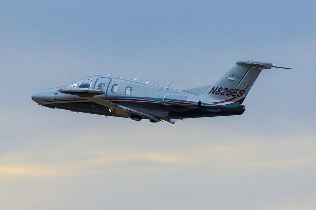 Eclipse 500 (N826ES) - I shot this photo shortly after takeoff from Atlanta's PDK airport. I thought the colors and clarity of this Eclipse 500 were fantastic so I wanted to share this photo. I shot the photo with a Canon 300mm lens at 1/6400 second F4.5 ISO 640. Positive votes and comments are always appreciated..! Thanks. Questions about this photo can be sent to Info@FlewShots.com