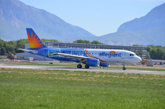 Airbus A320 (N228NV) - "Visit Florida" departing on 13 as AAY133 for Phoenix-Mesa (KIWA/IWA).