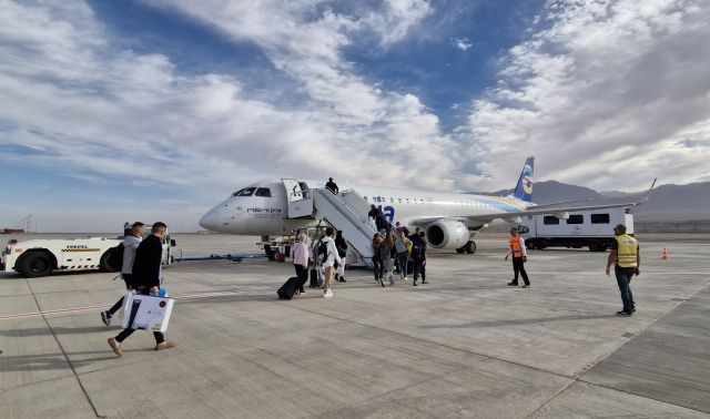 EMBRAER 195 (4X-EMC) - Boarding prior to a flight to Ben Gurion Airport from Ramon International Airport. This aircraft named after the famous Israeli singer the late Arik Einstein.