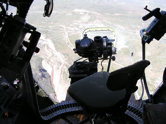 Boeing B-17 Flying Fortress (N5017N) - The bomb site and nose gunnery station on board Aluminum Overcast flying over the desert north of Phoenix, AZ