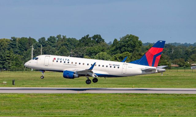 Embraer 170/175 (N810MD) - Delta Connection (Endeavor) E-170 a few feet from touchdown runway 22.