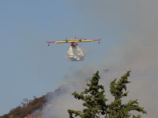 Canadair CL-415 SuperScooper (N242) - Scooper dropping water on Glendora Calif fire 1/16/14