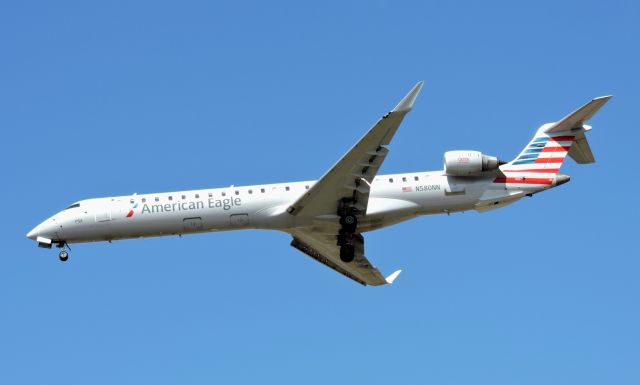 Canadair Regional Jet CRJ-900 (N580NN) - Seconds from landing, Mar. 2020.