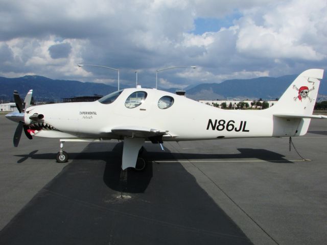 Beechcraft Bonanza (36) (N86JL) - Parked at Brackett Field.