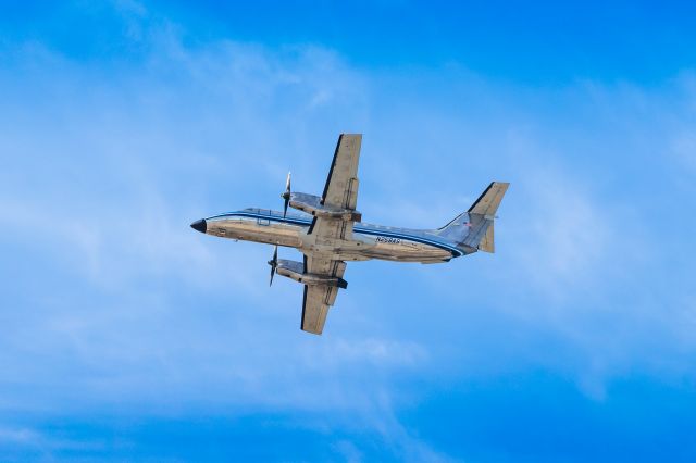 Embraer EMB-120 Brasilia (N258AS) - Ameriflight Embraer EMB-120 Brasilia taking off from PHX on 9/28/22. Taken with a Canon 850D and Rokinon 135mm f/2 manual focus lens.