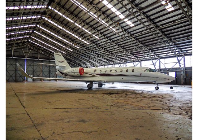 Cessna Citation Sovereign (VH-ZEK) - I was walking past what looked like an abandoned hangar in-between the falcon air / Navair hangar and the UNSW hangar at YSBK when I spotted this very nice looking Cessna Citation Sovereign.  Photo date : 17/04/2021 Camera : Nikon P510