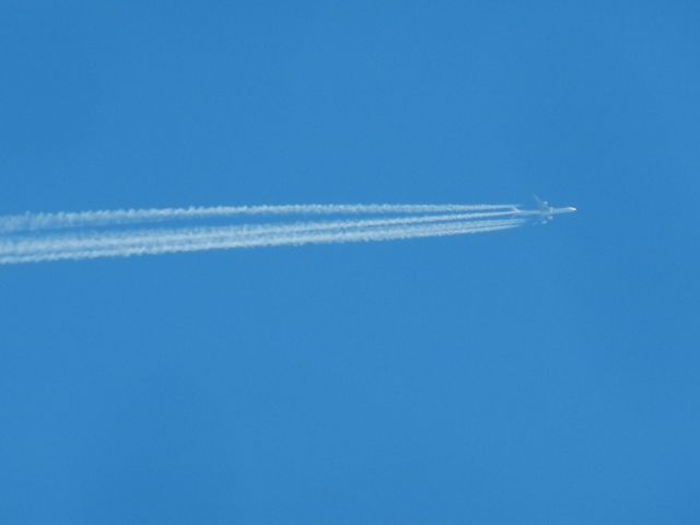 Airbus A340-600 (EC-JNQ) - EC-JNQ, An Airbus A340-642 of Iberia, painted in the Old Color Scheme, flies by my home En-Route to Mexico City