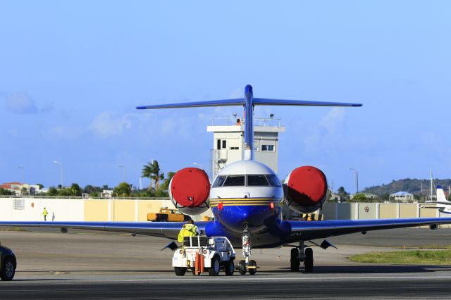 Bombardier Global 5000 (N723AB) - N723AB being towed to parking at St Maarten