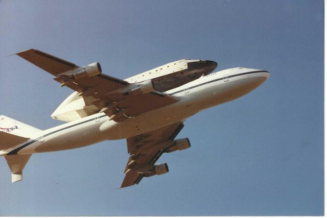 DISCOVERY — - Took this from the intersection of Sierra HW and Ave N due West of AF 42 on June 30+- a few days in 1996. Just found it while clearing up my once-I-retire pile...Take with an 80mm zoom lens onto 35mm film. did the math: 530 feet above me. 