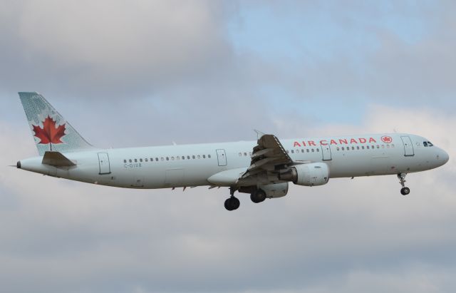 Airbus A321 (C-GIUB) - Approaching rwy 32 in the early morning.