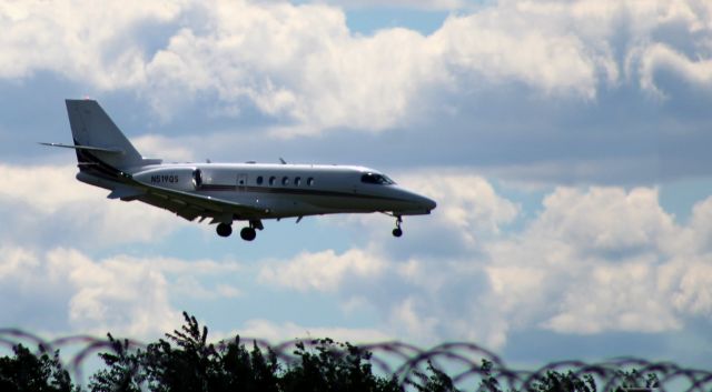 Cessna Citation Latitude (N519QS) - Breaking into the PHL Airport is this 2016 Cessna Citation Latitude in the Summer of 2020.