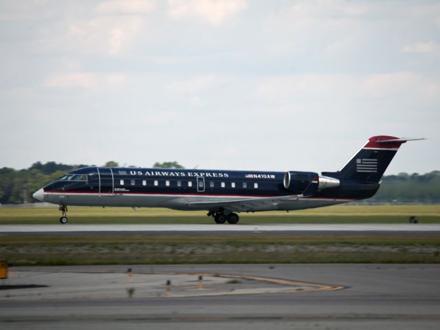 Canadair Regional Jet CRJ-200 (N410AW) - Take off runway 35. Rotation.