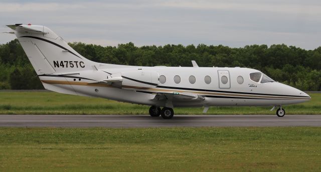 Beechcraft Beechjet (N475TC) - A 1997 model Beechjet 400A taxiing for departure at Boswell Field, Talladega Municipal Airport, AL after NASCAR'S 2023 GEICO 500 Race @ Talladega Superspeedway - late afternoon, April 23, 2023.