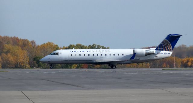 Canadair Regional Jet CRJ-200 (N431AW) - Taxiing to parking is this 2001 United Airlines Express Canadair Regional Jet 200LR in the Autumn of 2022.