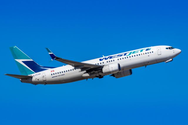 Boeing 737-800 (C-FCSX) - A WestJet 737-800 taking off from PHX on 2/10/23 during the Super Bowl rush. Taken with a Canon R7 And Canon EF 100-400 II L lens.