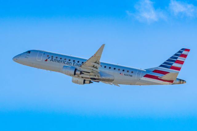 Embraer 175 (N247NN) - An American Eagle ERJ175 taking off from PHX on 2/11/23 during the Super Bowl rush. Taken with a Canon R7 and Canon EF 100-400 II L lens.