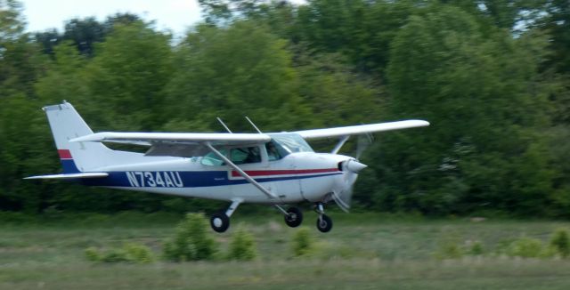 Cessna Skyhawk (N734AU) - About to touch down is this 1977 Cessna 172S Skyhawk in the Spring of 2023.