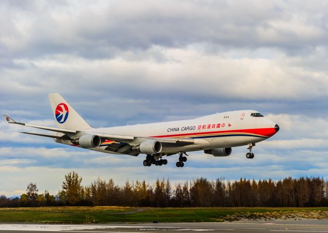 Boeing 747-400 (B-2425) - China Cargo Airlines Boeing 747 crosses the threshold for Anchorages Runway 15. The weather on this day was just like every other day in Anchorage; wait 5 minutes and itll change. It made shooting a challenge, but rewarding. br /br /© Bo Ryan Photography | a rel=nofollow href=http://www.facebook.com/boryanphotowww.facebook.com/boryanphoto/abr /br /Please vote if you like my images! Thank you!